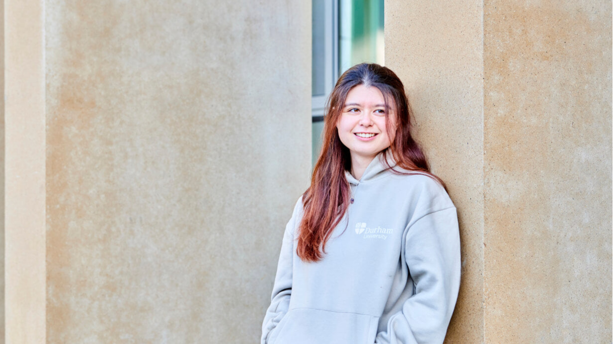 Student wearing stone hoody 